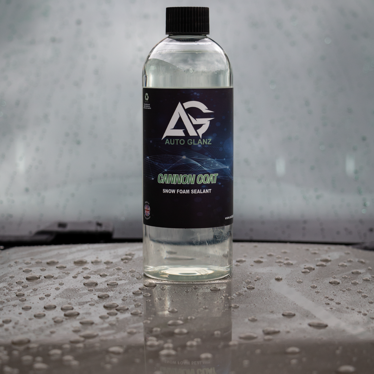 Extreme water beading and surface tension on car paint after applying Cannon Coat sealant.